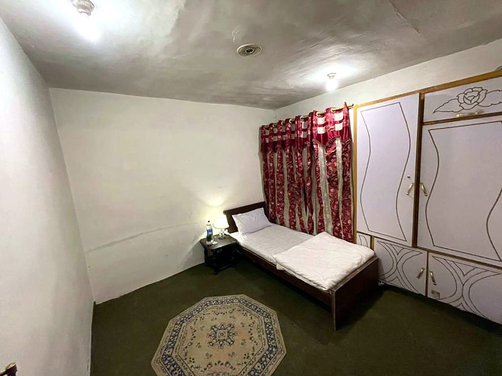 Single Room with a twin bed at Ringchan Guest House